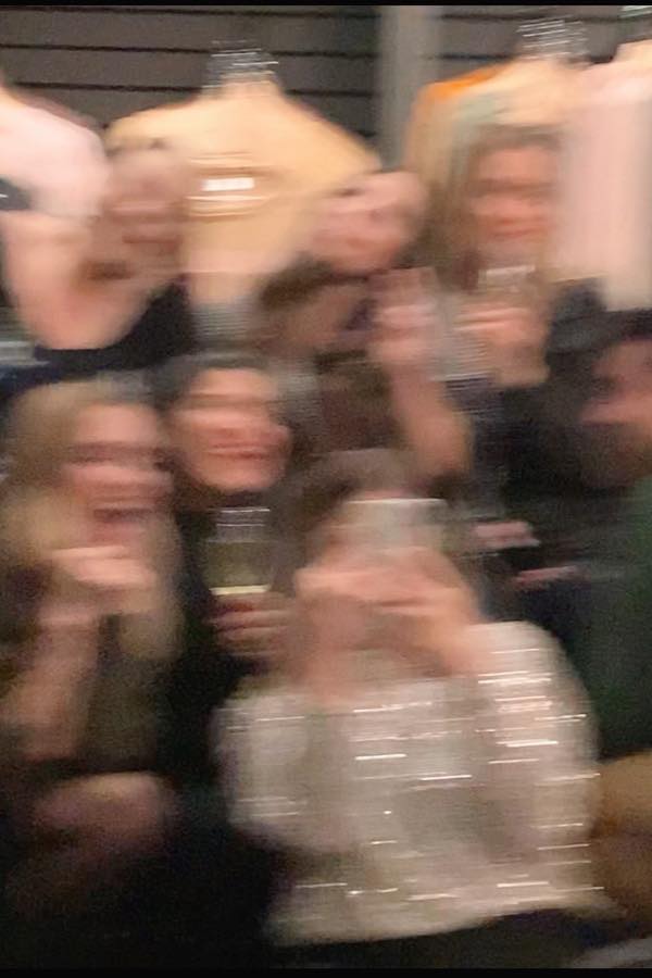 Guests at an event adding their photos to one shared album from their own phones