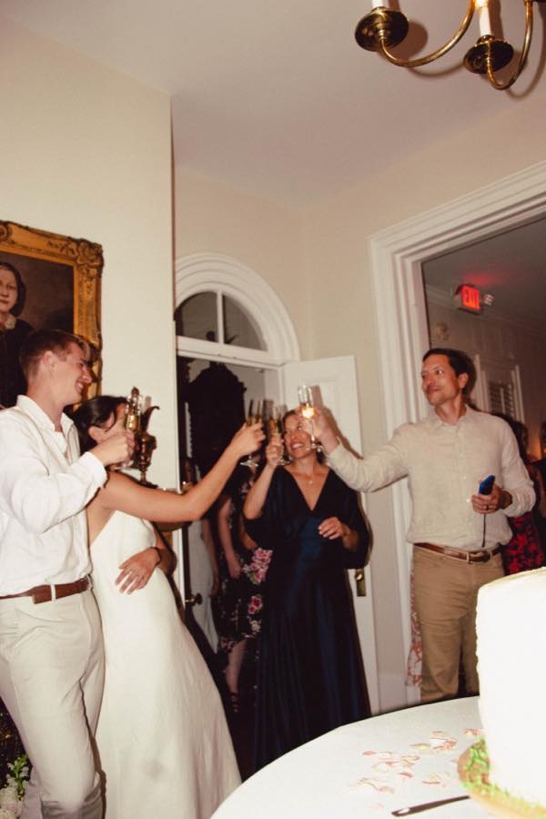 Guests at an event adding their photos to one shared album from their own phones