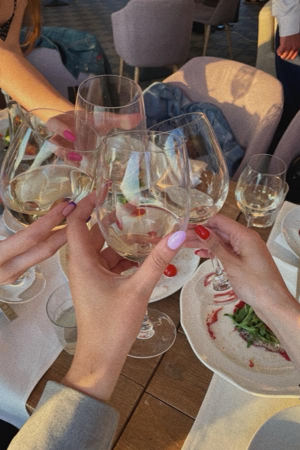 Guests at an event adding their photos to one shared album from their own phones